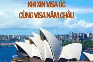 A building with white roof and white sails on a body of water AI-generated content may be incorrect.